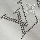 Flat lay presentation of Louis Vuitton cotton t-shirt with logo-detail design