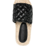 Close-up of Bottega Veneta flats hardware and fine stitching