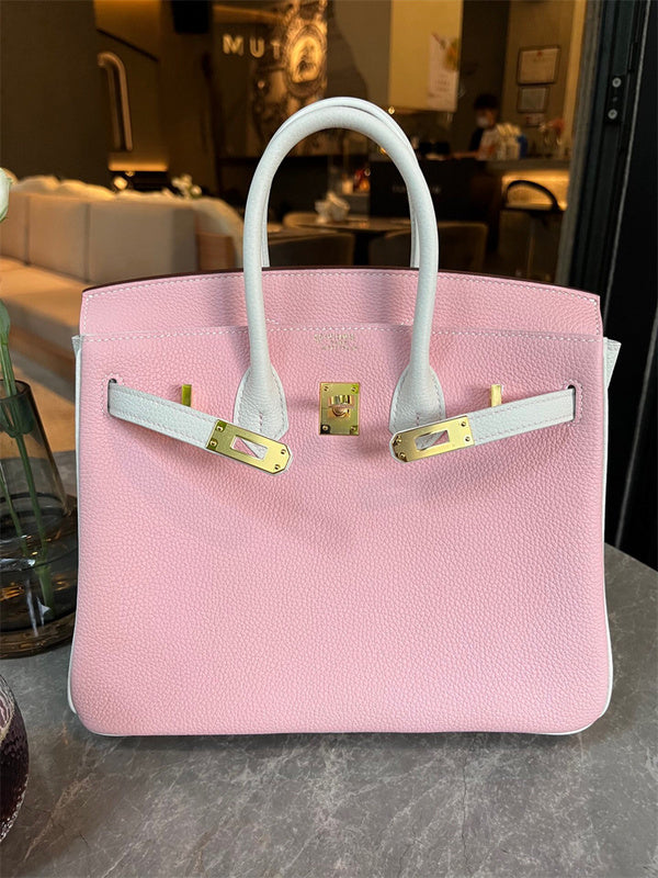 Side view of polished structured handbag