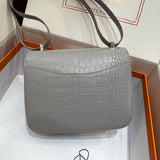 Side view of structured structured handbag