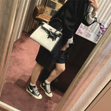 Minimalist handbag styled for everyday wear