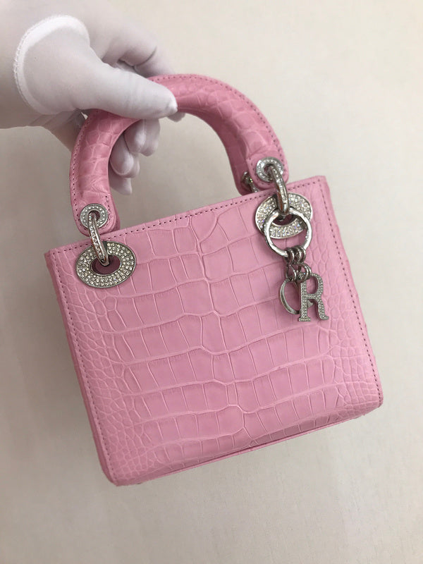 Styled lifestyle shot of signature sleek women's handbag – women's designer-style accessory