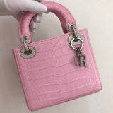 Styled lifestyle shot of signature sleek women's handbag – women's designer-style accessory