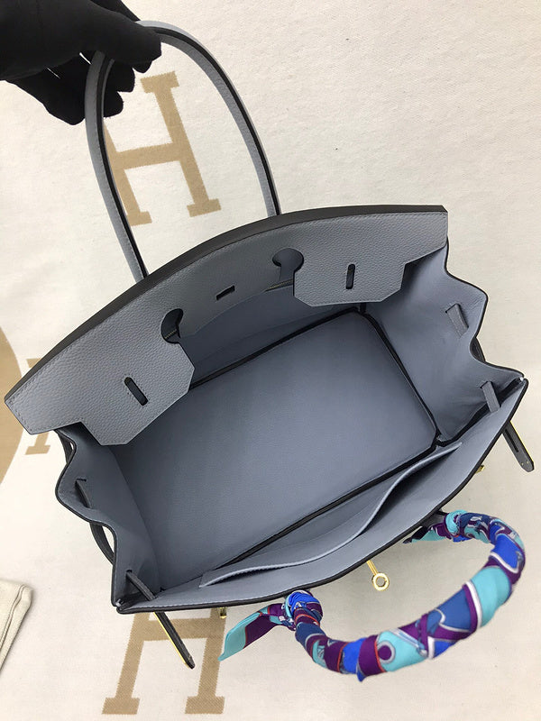 Side view of refined structured handbag