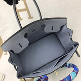 Side view of refined structured handbag