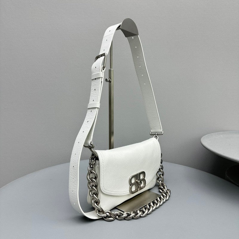 Zivas Charm Modern Edge Statement Handbag (Signature Shape & Finish) – Lifestyle Shot