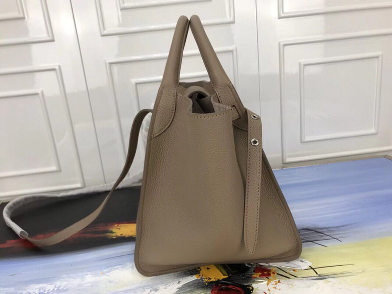 Styled lifestyle shot of modern premium women's handbag – women's statement bag