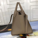 Styled lifestyle shot of modern premium women's handbag – women's statement bag