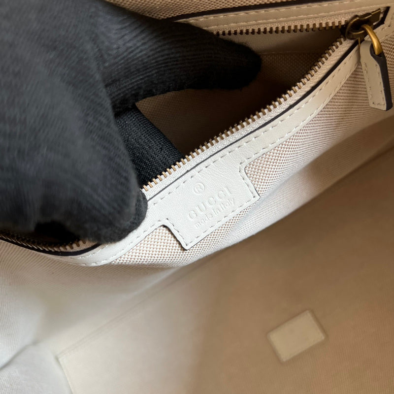 Side view of elegant structured handbag