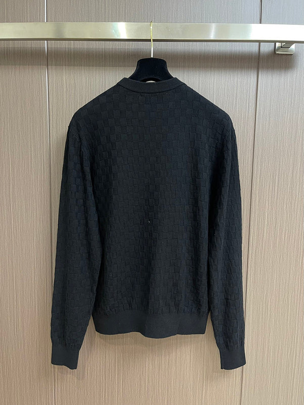 Side profile of Louis Vuitton luxury clothing with label-forward styling