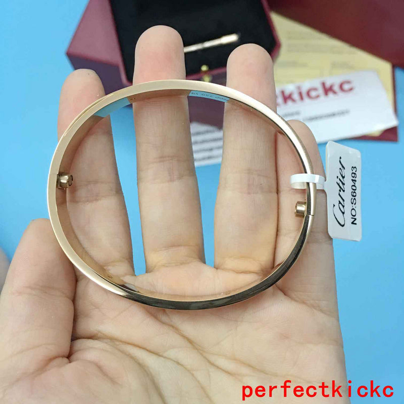 Front view of Cartier unisex jewelry piece