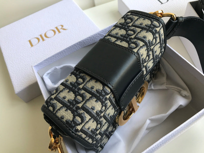 Back view of polished signature women's handbag – women's designer-style accessory