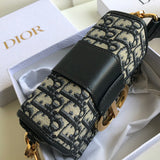 Back view of polished signature women's handbag – women's designer-style accessory