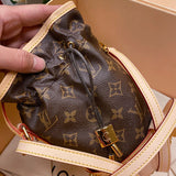 Styled lifestyle shot of polished sleek women's handbag – women's premium purse