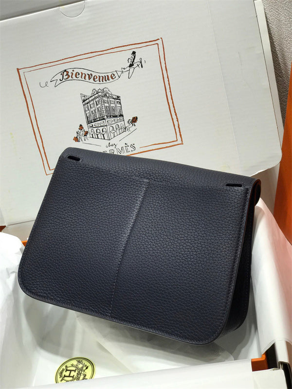 Side view of understated structured handbag