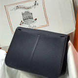 Side view of understated structured handbag