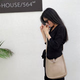 Side view of elegant structured handbag