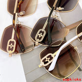 Close-up detail view of Louis Vuitton unisex sunglasses