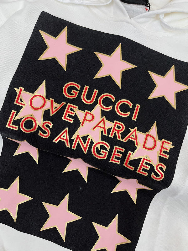 Side profile of Gucci luxury clothing with logo-detail design