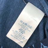 Flat lay presentation of Louis Vuitton cotton t-shirt with label-forward styling