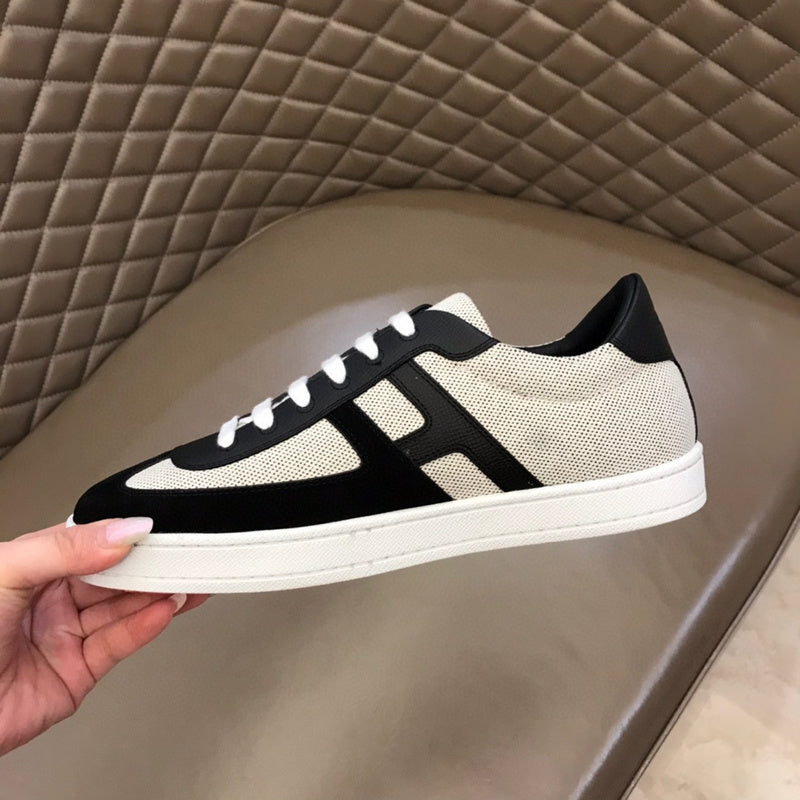 Hermès Beige Low-Top Sneakers - Angled View