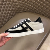 Hermès Beige Low-Top Sneakers - Angled View