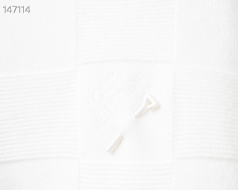 Front view of Louis Vuitton luxury clothing with tailored silhouette