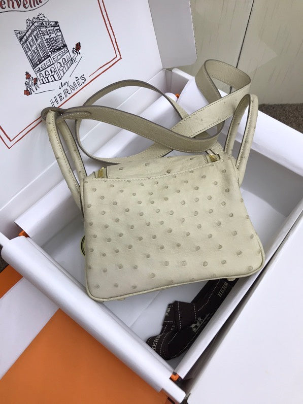 Side view of curated structured handbag