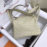 Side view of curated structured handbag