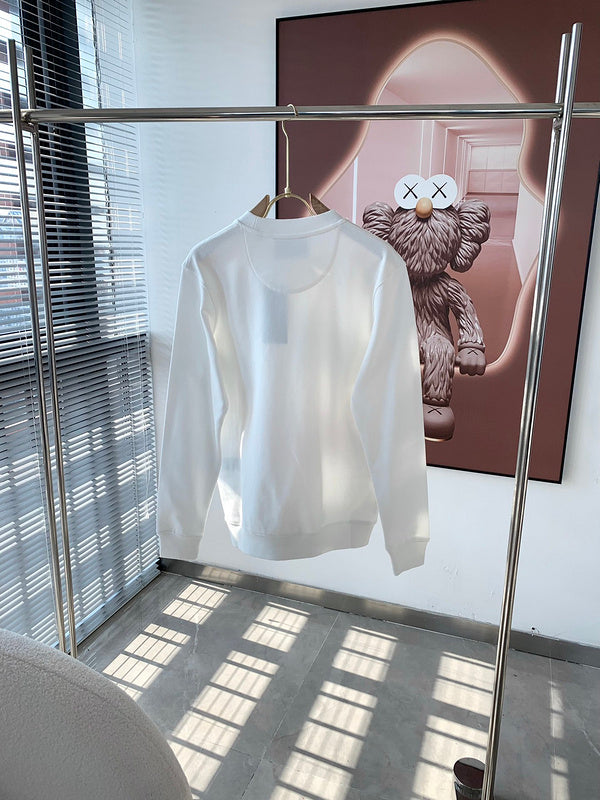 Full styled look of Gucci luxury clothing with monogram-inspired silhouette