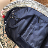 Styled lifestyle shot of polished premium women's handbag – women's luxury handbag