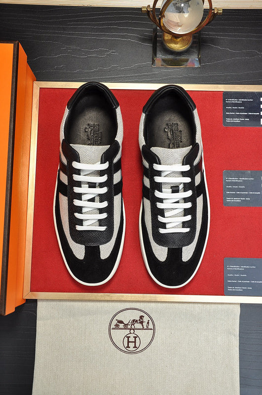 Hermes shoes Style 199 - close-up of statement logo accent