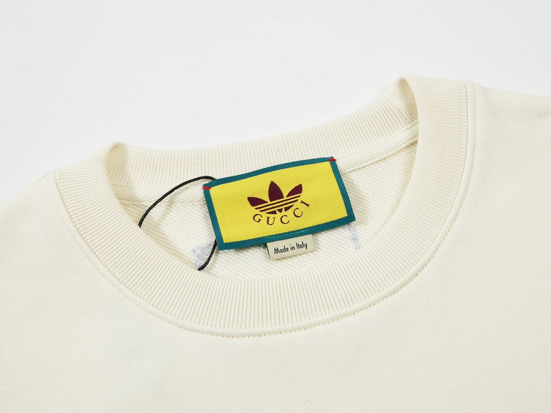 Close-up detail shot of Gucci luxury clothing with streetwear-inspired cut