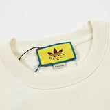 Close-up detail shot of Gucci luxury clothing with streetwear-inspired cut