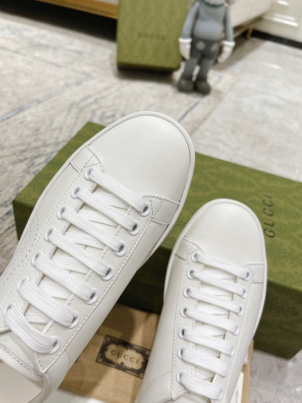 Side profile of Gucci crisp white sneakers everyday casual design