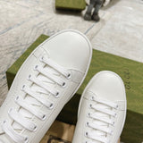 Side profile of Gucci crisp white sneakers everyday casual design