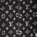 Flat lay presentation of Louis Vuitton luxury clothing with relaxed-fit cut