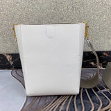 Styled lifestyle shot of classic modern women's handbag – women's luxury accessory