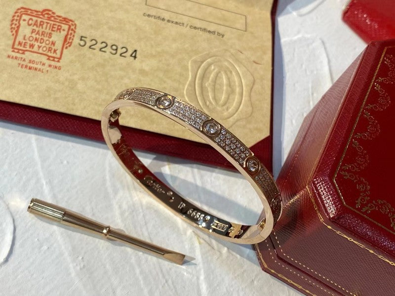 Close-up detail view of Cartier unisex jewelry piece