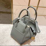 Side view of effortless structured handbag
