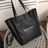 Front view of polished chic women's handbag – women's designer-style accessory