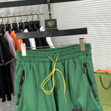 Close-up detail shot of Rhude luxury clothing with monogram-inspired silhouette