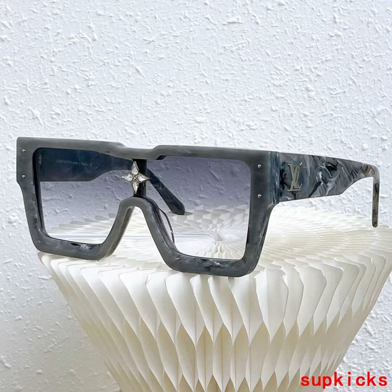 Close-up detail view of Louis Vuitton unisex sunglasses