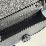 Side profile of elevated premium women's handbag – women's statement bag