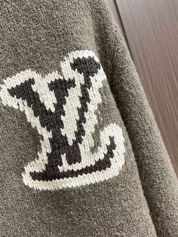 Flat lay presentation of Louis Vuitton luxury clothing with monogram-inspired silhouette
