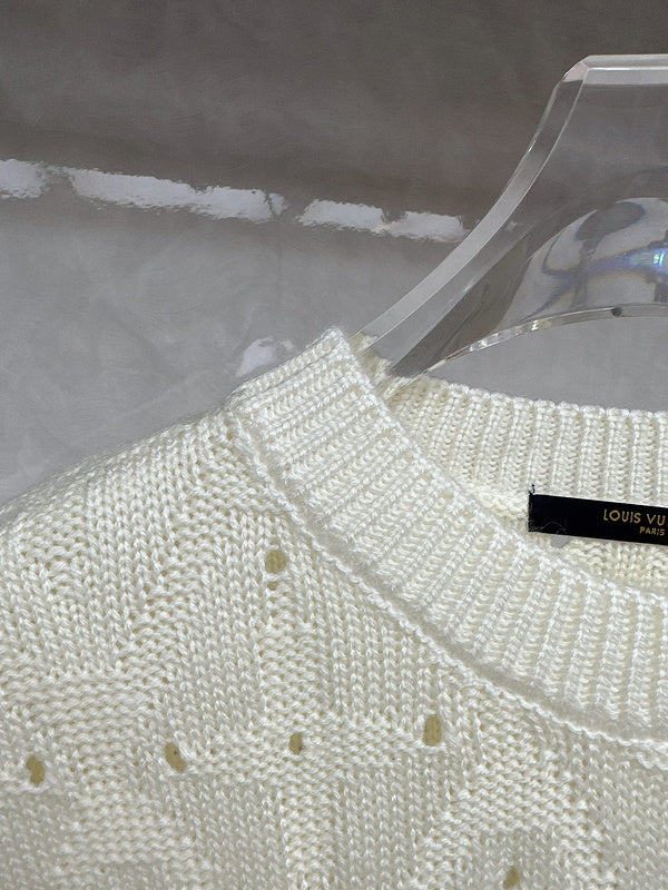 Close-up detail shot of Louis Vuitton luxury clothing with streetwear-inspired cut