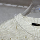 Close-up detail shot of Louis Vuitton luxury clothing with streetwear-inspired cut