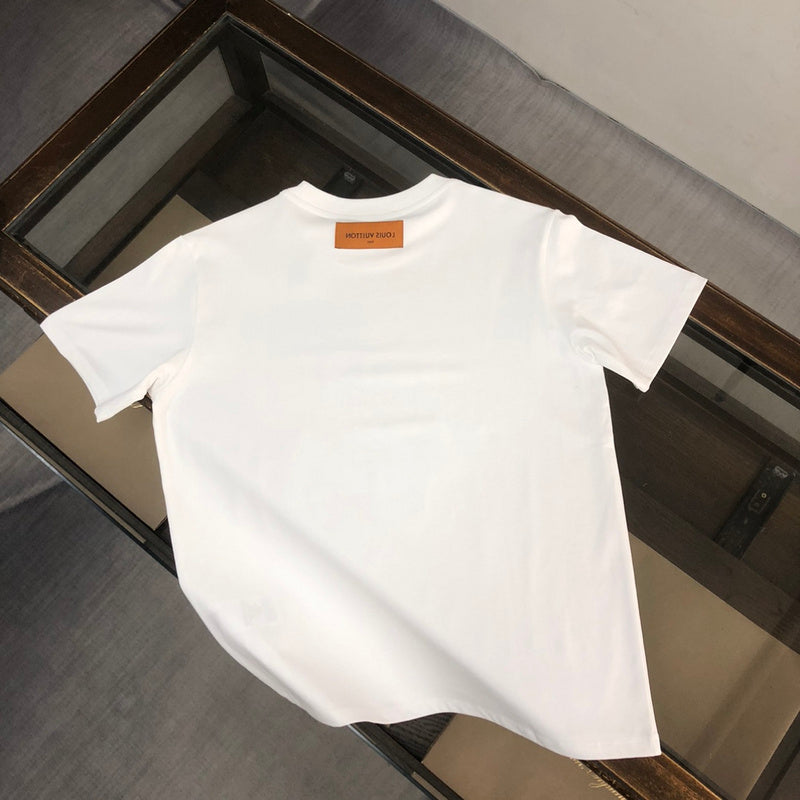 Close-up detail shot of Louis Vuitton cotton t-shirt with label-forward styling