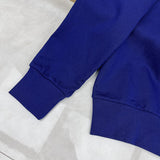 Flat lay presentation of Gucci luxury clothing with logo-detail design