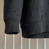 Texture and finish detail of Givenchy luxury piece style No.109